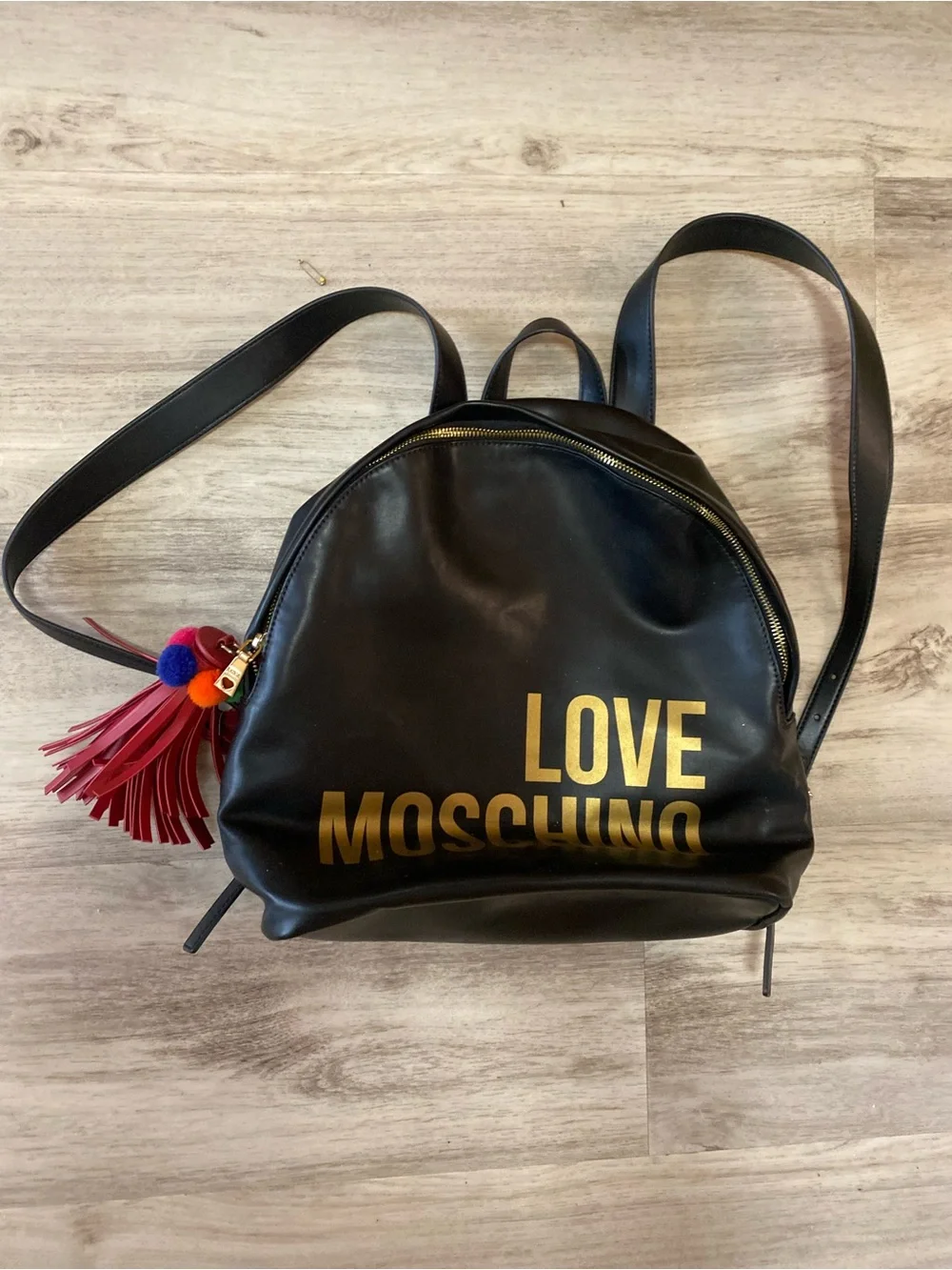Love Moschino Black Backpack with Gold Logo and Red Tassel